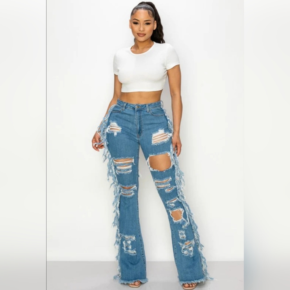 Distressed fringe denim jeans